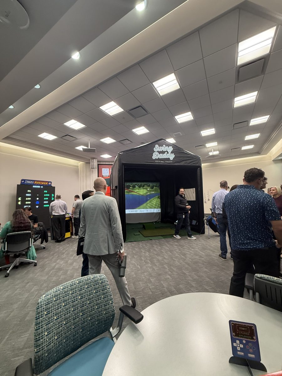 Premium mobile golf simulator experience at an Oklahoma corporate event